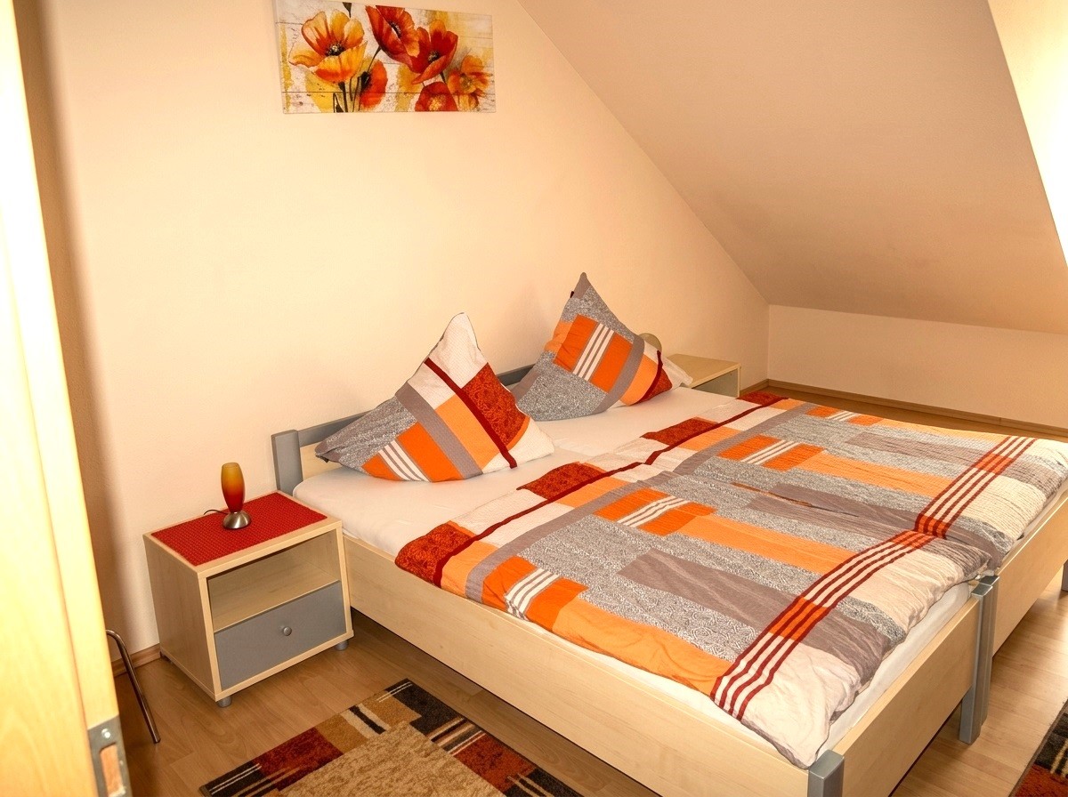 Ferienwohnung - Schlafzimmer